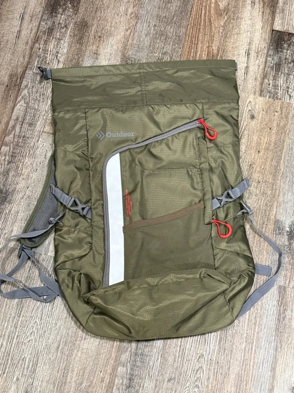 Outdoor Products green roll-top camping backpack
